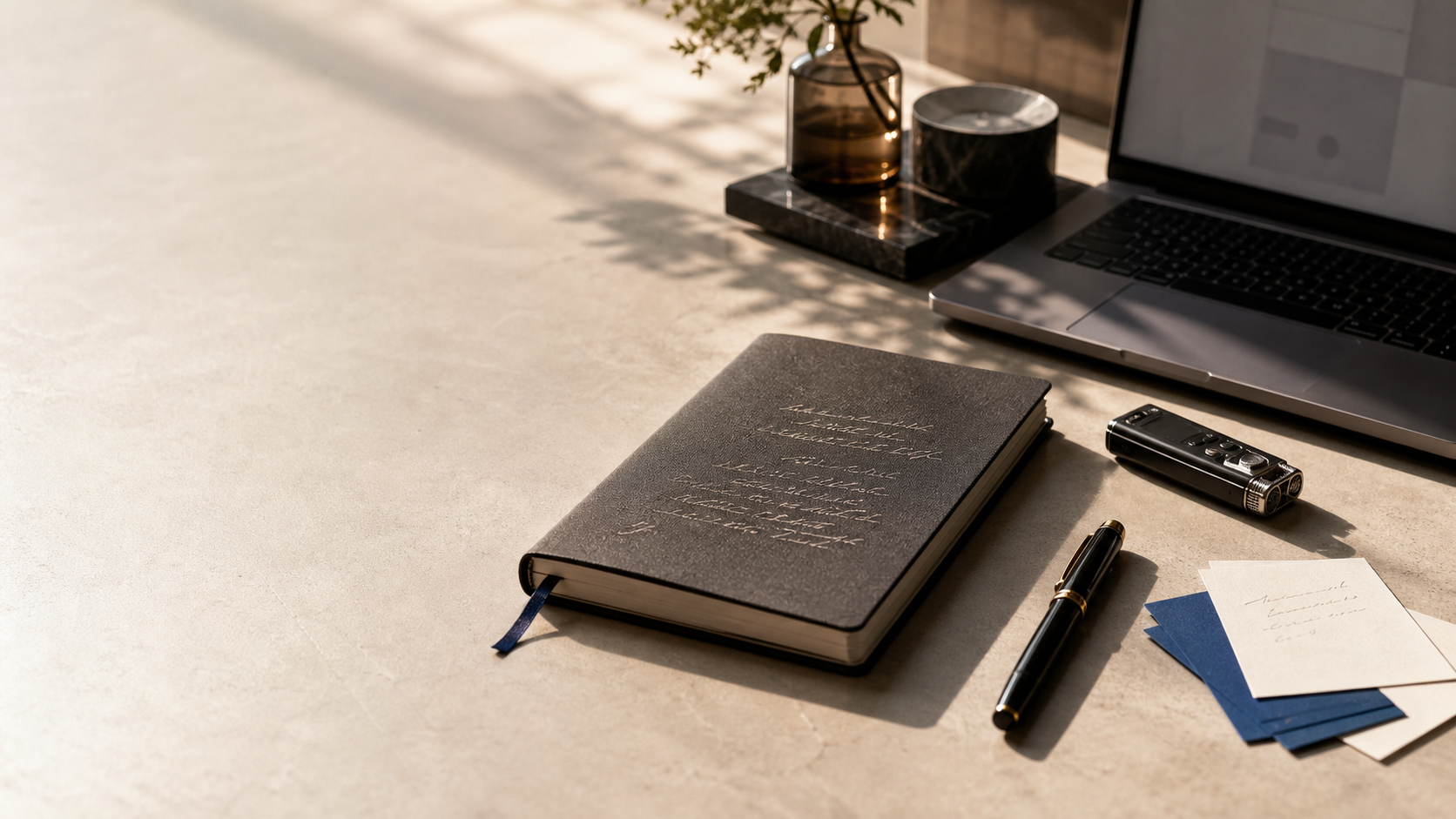 A calm meeting-notes evaluation desk with a notebook, recorder, and laptop
